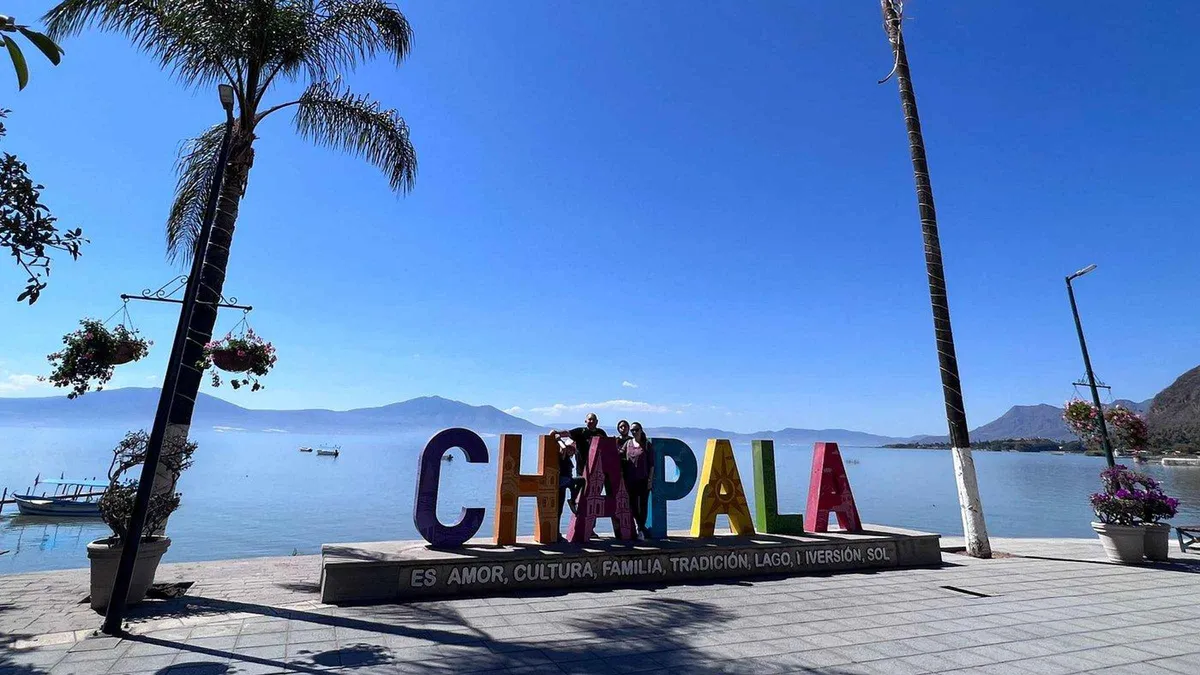 Muralled wall and cobbled lane in Ajijic on a Lake Chapala premium day trip from Guadalajara